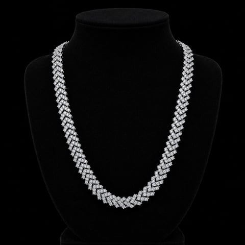 Diamond tennis necklace with white stones displayed on a black velvet bust form