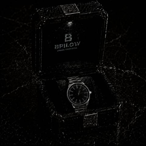 BPILLOW luxury wristwatch displayed in black textured packaging box with branded lid