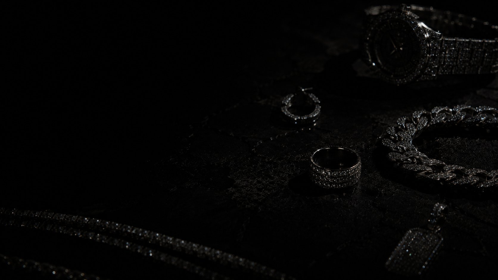 Water droplets and bubbles splashing on dark surface with motion blur effect