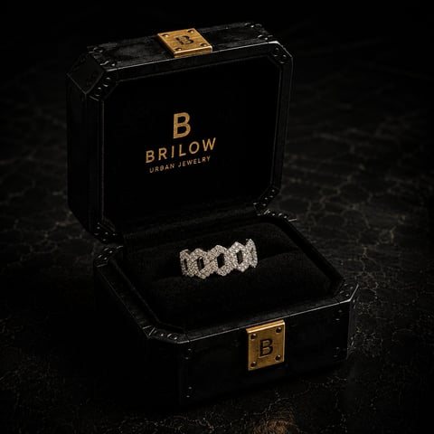 Brilow brand black jewelry box with gold accents displaying a diamond-studded ring on black velvet